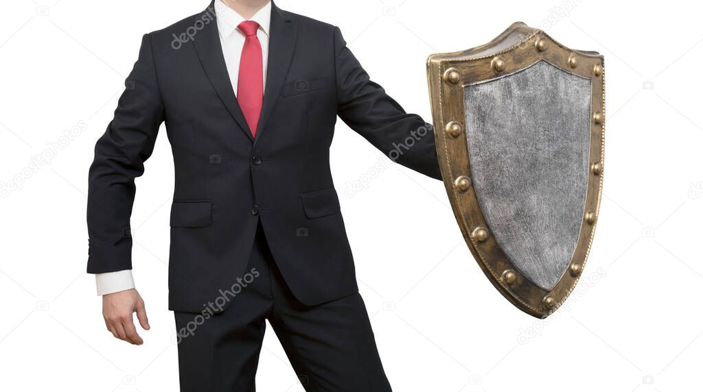 Businessman with shield isolated on white background with clipping path. Business protection concept.