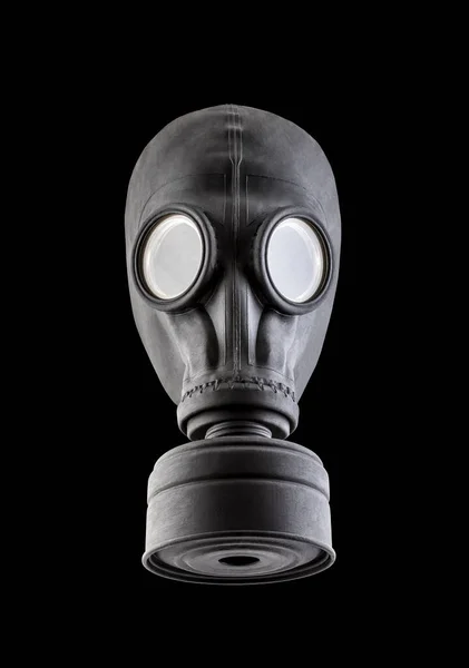 Black gas mask isolated on black background. Environment pollution.