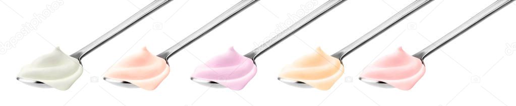 Spoons of fruit yogurt