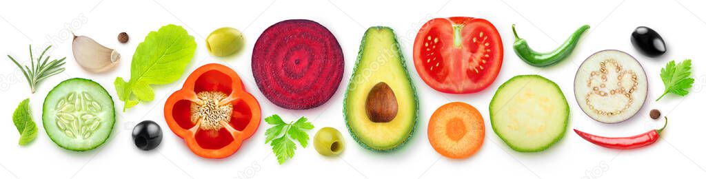 Isolated vegetable halves. Raw cut vegetables top view (beetroot, zucchini, carrot, avocado, bell pepper, cucumber, eggplant, tomato, spices and herbs) isolated on white background