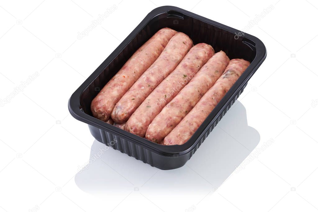 Plastic container with raw sausages isolated on white