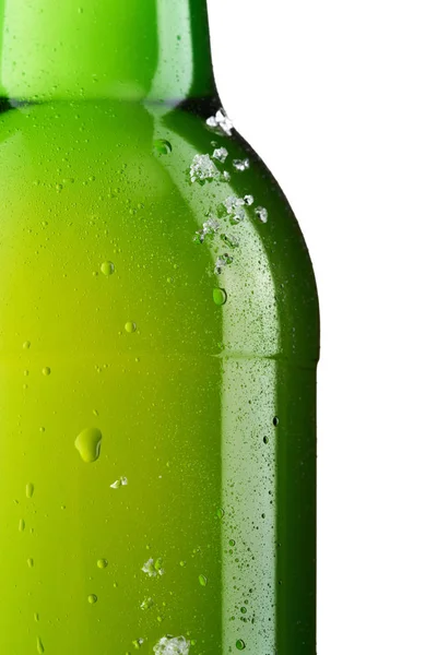 Bottle of ice cold beer with ice and drops — Stock Photo, Image