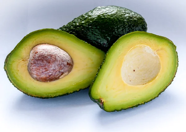 Avocado, cut in half, — Stock Photo, Image