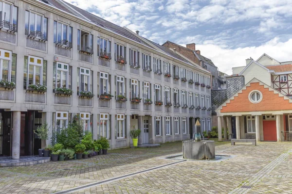 Old building, square and fountain in Liege, Belgium — Stock Photo, Image