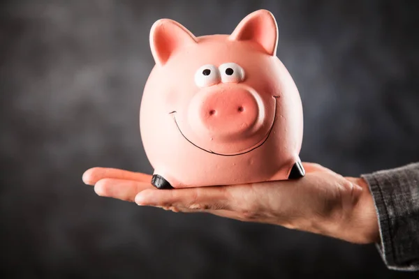 Piggy bank op zwarte achtergrond — Stockfoto