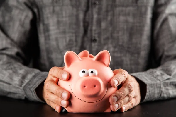 Piggy Bank sobre fondo negro —  Fotos de Stock