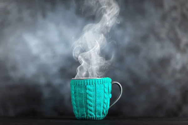 Coffee mug in a wool cover — Stock Photo, Image