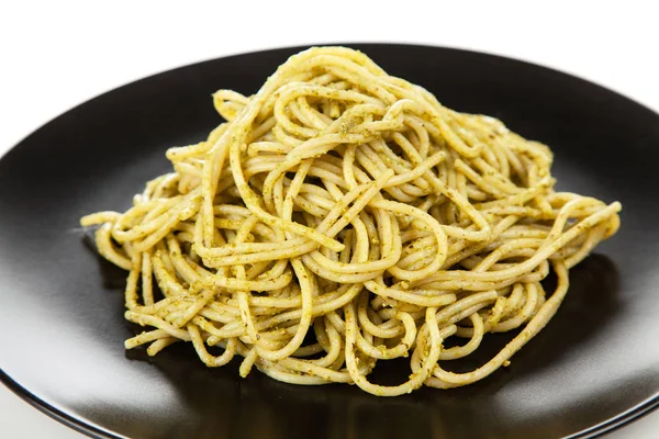 Pasta with pesto sauce — Stock Photo, Image