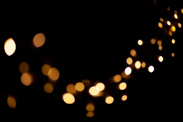 Objektiv bokeh na černém pozadí — Stock fotografie