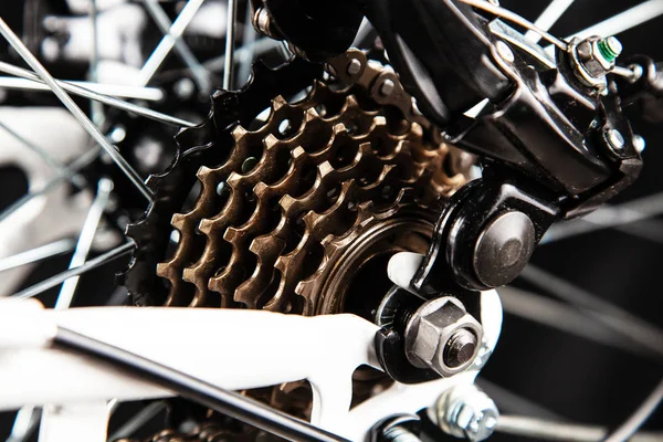 Bicycle parts isolated on black — Stock Photo, Image