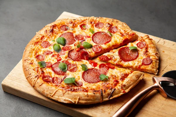 Pizza with salami and chorizo — Stock Photo, Image