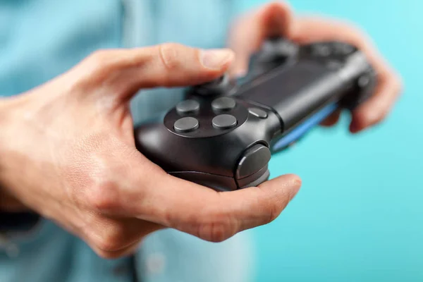 Male hands holding a gaming controller — Stock Photo, Image