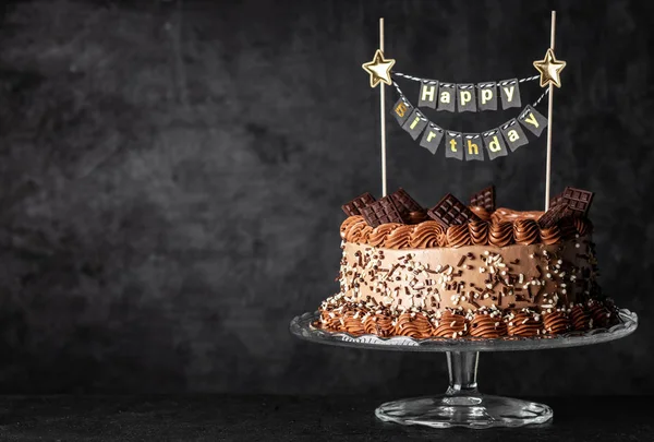 Chocolate cake on dark background — Stock Photo, Image