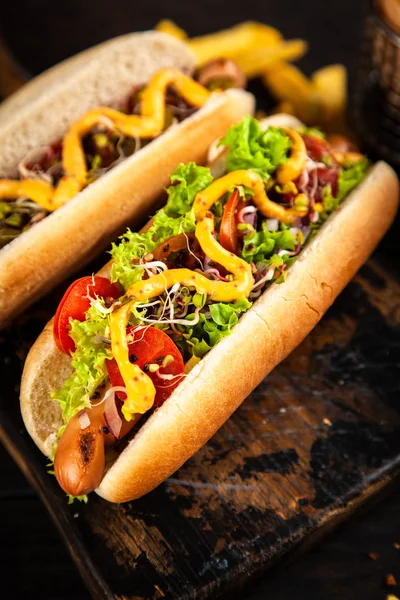 Három ízletes hotdogs — Stock Fotó