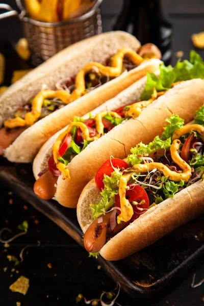 Three delicious hotdogs — Stock Photo, Image