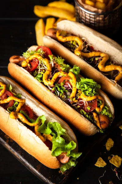 Three delicious hotdogs — Stock Photo, Image