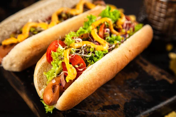 Three delicious hotdogs — Stock Photo, Image