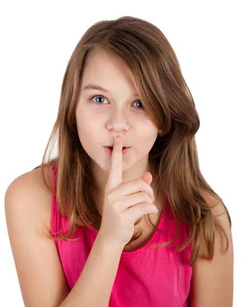 一个年轻女孩的肖像与手指在她的嘴唇上 孤立在白色 — 图库照片