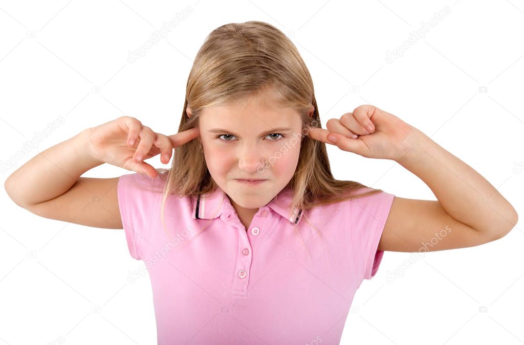 little girl is closing her ears with her fingers