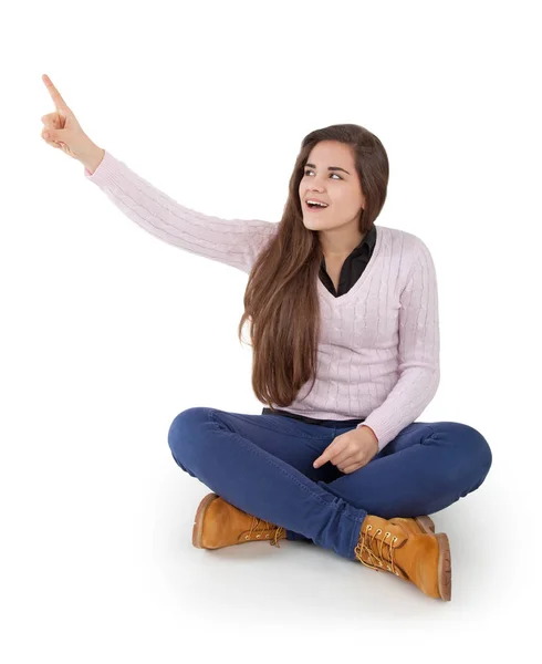 Jeune femme pointant du doigt — Photo