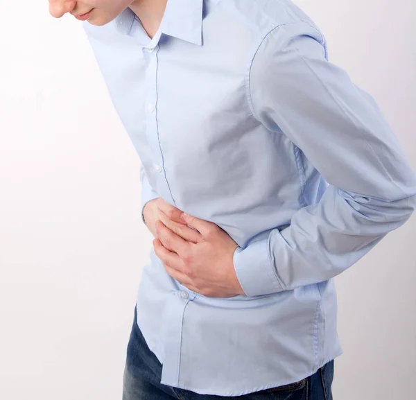 Ragazzo con mal di stomaco — Foto Stock