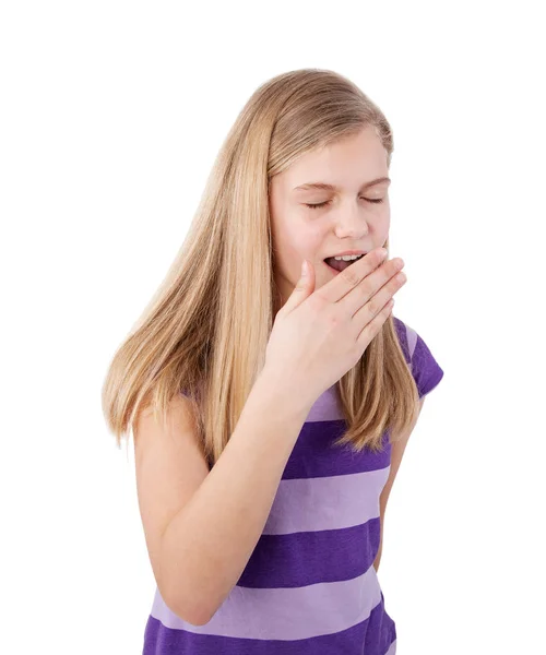 Молодая девушка зевает — стоковое фото