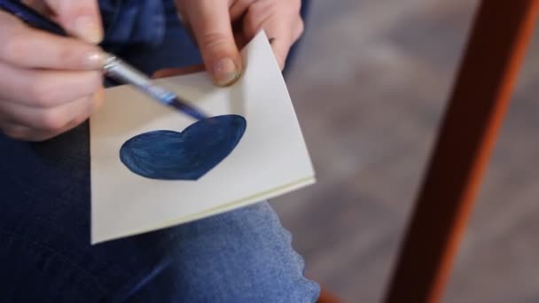 Closeup Woman Artist Hands Painting Blue Heart Postcard — Stock Video