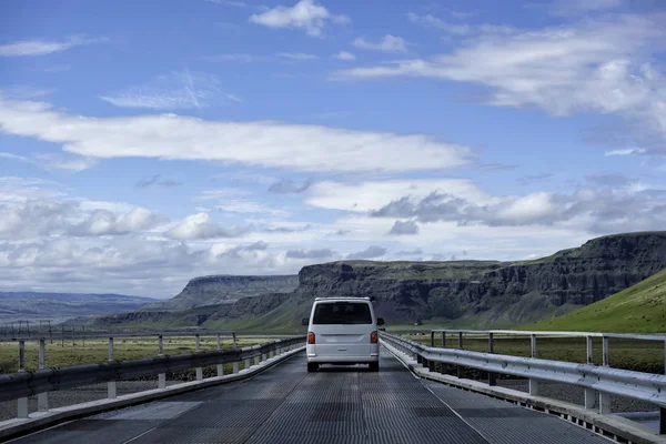 Van driving over bridge — Stock Photo, Image