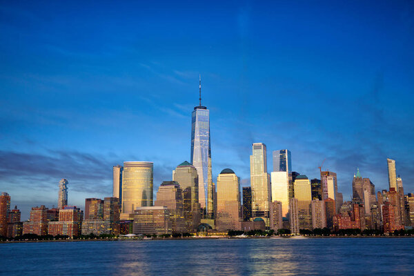 New York City Manhattan skyline with modern skyscrapers at dusk