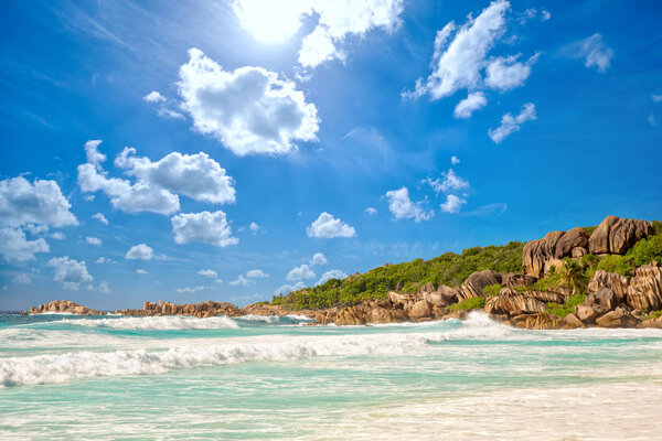 Waves at Grande Anse beach in La Digue Island, Seyshelles