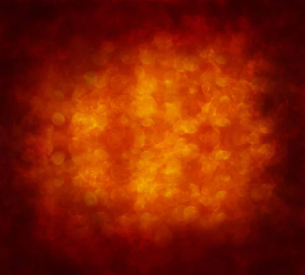 Абстрактный оранжевый фон с боке — стоковое фото