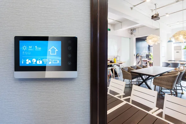 smart home app in control panel in modern restaurant