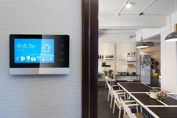 smart home app in control panel in modern restaurant