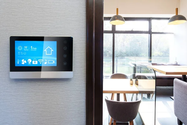 smart home app in control panel in modern restaurant