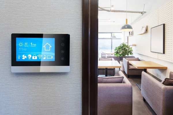 smart home app in control panel in modern restaurant