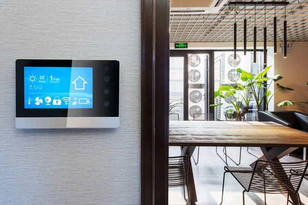 smart home app in control panel in modern restaurant