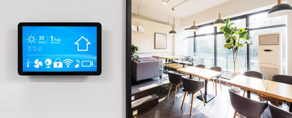 smart home app in control panel in modern restaurant