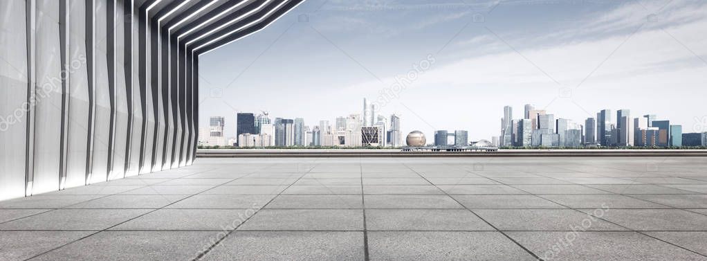 modern building and empty floor with skyline