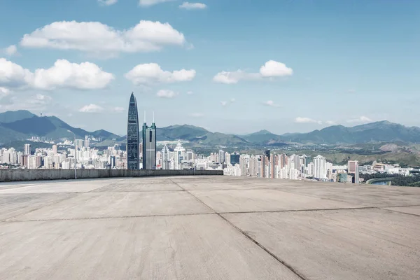 skyscrapers of a modern city with overlooking perspective under blue sky