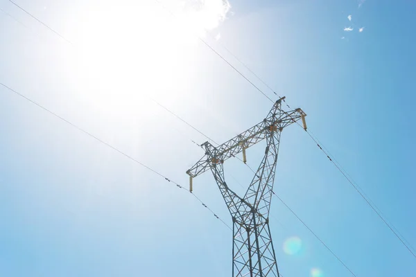 High voltage transmission tower or power towers (electricity pylon) and electrical distribution substation