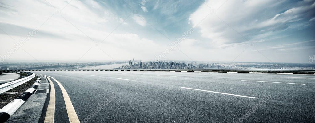 empty highway through modern city