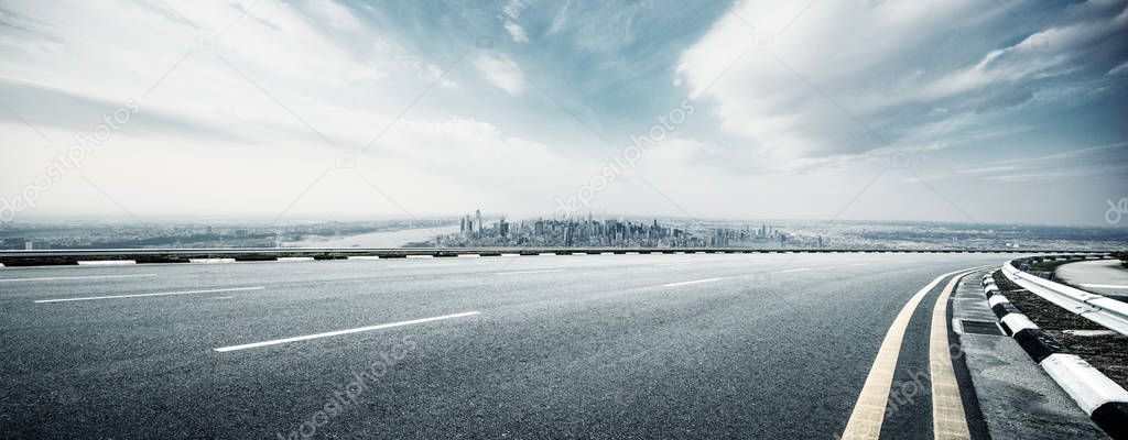 empty highway through modern city