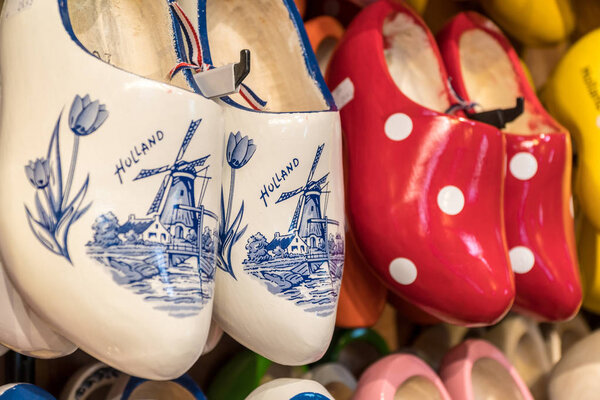Wooden clogs with picture of windmill in souvenir store in Netherlands