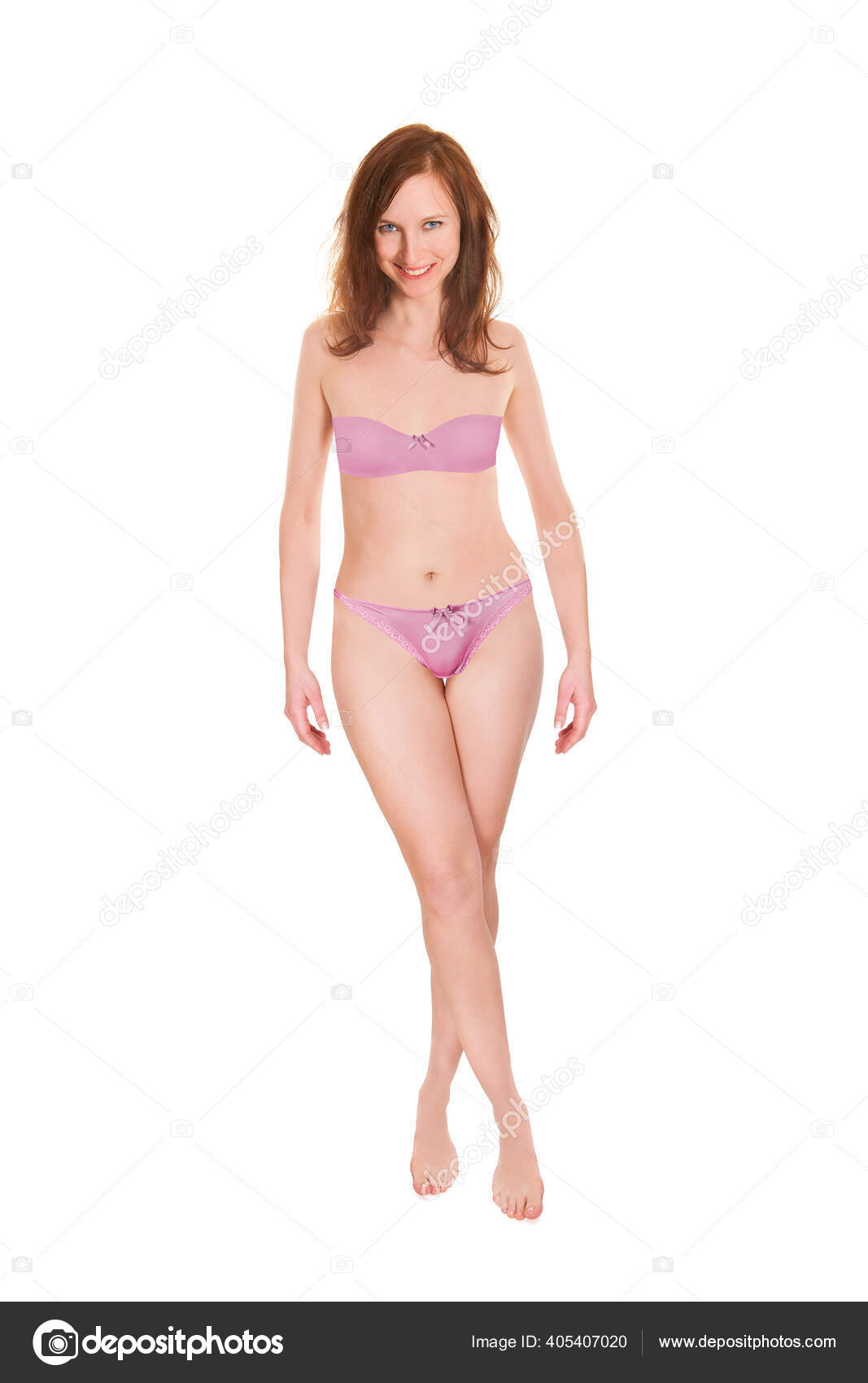 Slim woman wearing pink panties Stock Photo