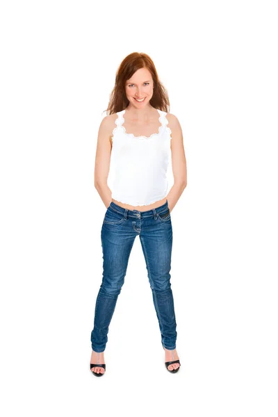 全长肖像一个美丽的微笑的女人穿着蓝色牛仔裤和上衣 孤立在白色的工作室背景 — 图库照片