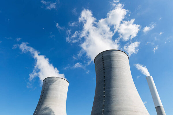 cooling water tower closeup, industrial landscape and the concept of carbon emissions