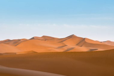 desert dusk landscape, setting sun shone over the dunes, clipping path included clipart