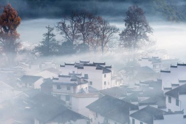 traditional chinese village in early morning,  beautiful wuyuan landscape in late autumn clipart
