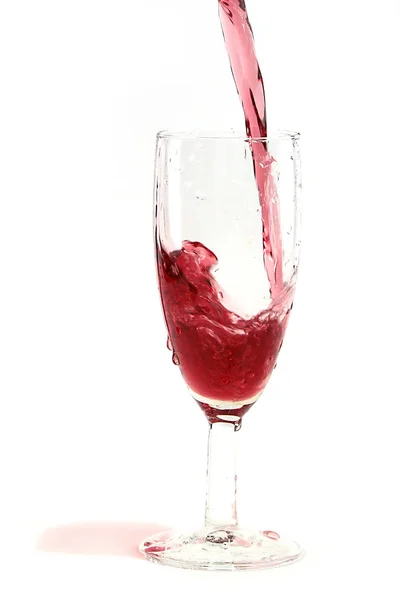 赤ワインは グラスにぽんと鳴らすときに美しいパターンを作成します — ストック写真