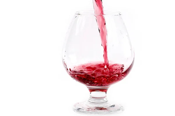 Odrobiną Czerwonego Wina Gdy Przelewa Się Szklanki — Zdjęcie stockowe